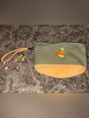 No Boundaries Green Canvas Wristlet Pouch with Orange Accent